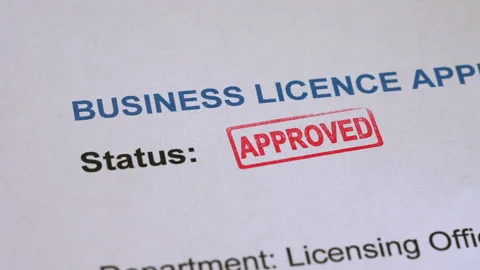 Business Licence Application Approved Stamp Coming Down on Form Stock Footage 342024077