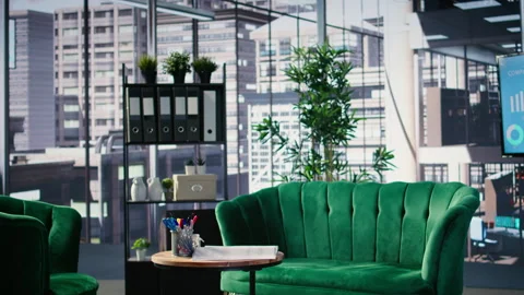 Business lobby featuring sofa in a bright modern boardroom with glass elements Stock Footage 309373774