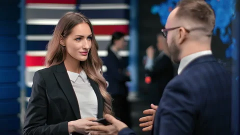 Business male and female in trendy suits talking planning job at modern hi tech Stock Footage