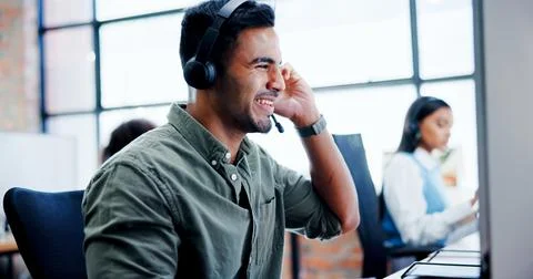 Business, man and headset with computer at call centre for customer service Stock Photos