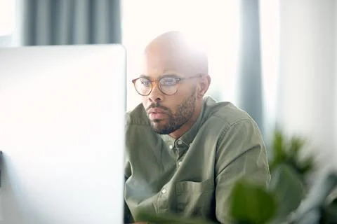 Business, man and reading computer in office for garden writer, blog post u.. Stock Photos