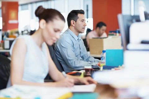 Business, man and reading on computer in office for article review, fact Stock Photos