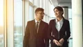 The business man and a woman discuss near windows in the office. slow motion 4k or 4k+ Resolution