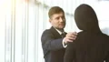 The business man and a woman talking in the office 4k or 4k+ Resolution