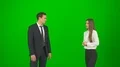 The business man and woman touch the virtual screen on the green background 4k or 4k+ Resolution