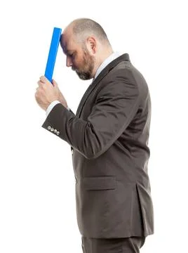 Business man with blue folder An image of a handsome business man with a b... Stock Photos
