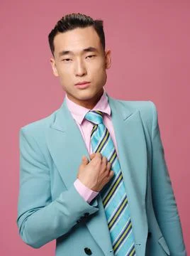 Business man blue suit businessman pink background lifestyle emotions self Stock Photos