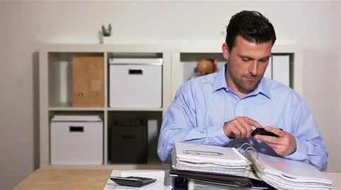 Business man browing the internet with smartphone Stock Footage 11134949