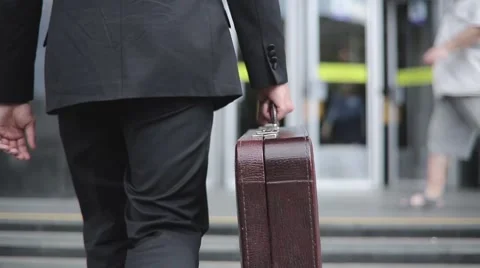 Business Man With Case While Commuting To Work Video stock 62833965