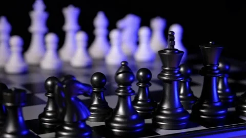 Business man chess at table. Player makes a move, developing chess strategy. Stock Footage 145074031