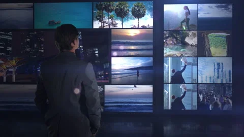 Business man choosing future path from video wall Stock Footage 321388124