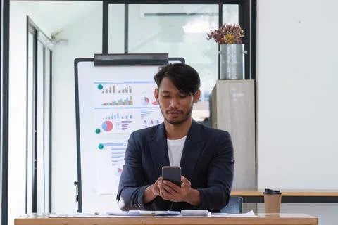A business man completes KYC using an online banking program in order to open a Foto stock