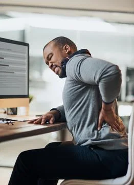 Business man, computer and back pain with working in office on tech with injury Stock Photos