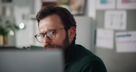 Business man, computer and serious in office for reading article, fast checking Stock Footage 316761837