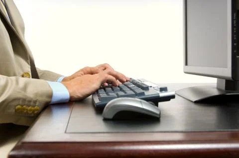 Business man on computer Stock Photos