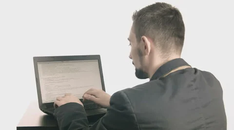 Business man computer programmer typing at his desk Stock Footage 45885462