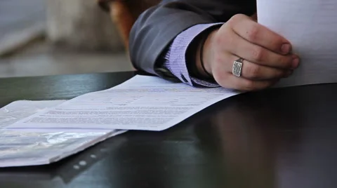 Business man considers documents Stock Footage 40310960