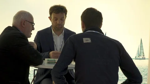 Business man dealing with clients  Stock Footage 88548379
