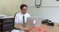 Business man doesn't believe what he is reading on screen HD Footage