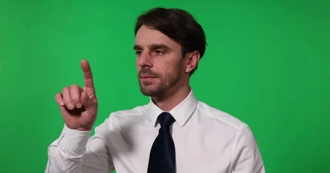 Business Man Dragging Virtual Panel Holographic Monitor Green Screen Background Video stock 77039055