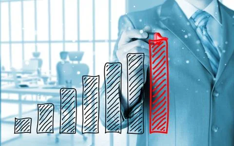 Business man drawing a growing graph Illustrazione stock