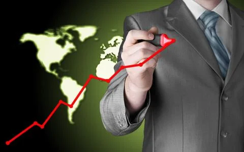 Business man drawing a growing graph Illustrazione stock