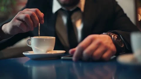 Business man drinking coffee in cafe Stock Footage 55759324