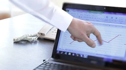 Business man explaining a chart Stock Footage 35573562