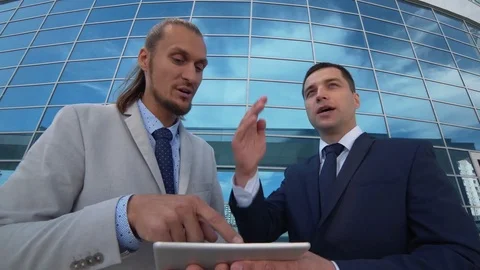Business man explains the direction of the development of a new project Stock Footage 77741565