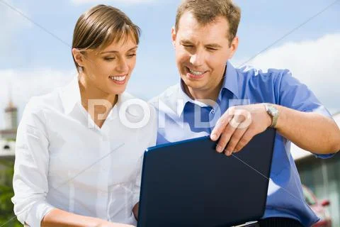 Business man explains the marketing plan of work to his colleague Stock Photos