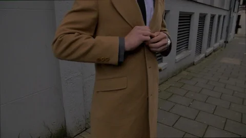 Business man fixing up his jacket and suit, getting ready for work slow motion Stock Footage 85669799