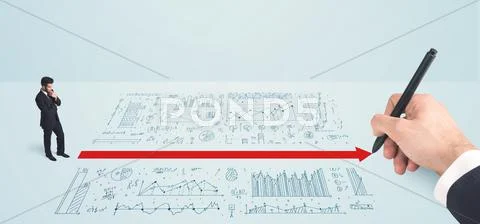 Business man in front of hand drawn maze Stock Photos