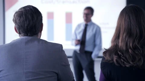 Business man giving a presentation in conference room Stock Footage 59378989