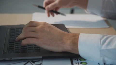 Business man hands with using laptop to work and writing on paper with a pen. 스톡 동영상 119461484