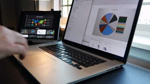 Business man hands using laptop computer working from home in a home office. Stock Footage 128605606