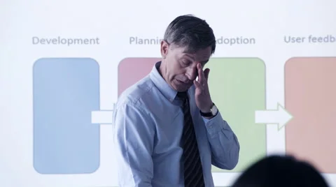 Business man interacting with executives during a presentation Stock Footage 59379426