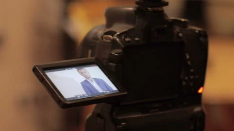 Business man interviewed looking into camera Stock Footage 64233504