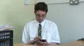 Business man looking at mobile phone HD Footage