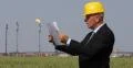 Business Man Looking Petrochemical Plant Blueprint Studying Ecological Project 4k or 4k+ Resolution