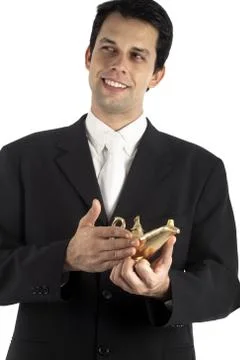 Business Man with Magic Lamp Stock Photos