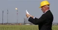 Business Man Petroleum Industry Examining Oil Plant Refinery Pollution Emissions 4k or 4k+ Resolution