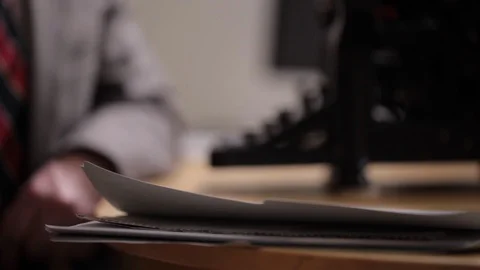 BUSINESS MAN PICK UP FILE FOLDER Stock Footage 91158063