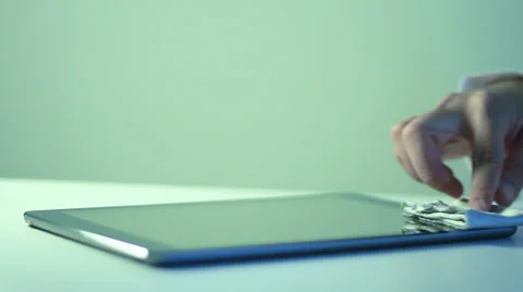 A business man is playing with iPad Stockbeeldmateriaal 36626641