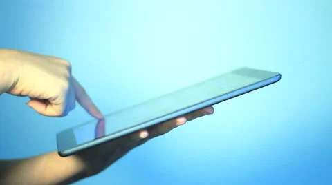 A business man is playing with iPad Stockbeeldmateriaal 36627077