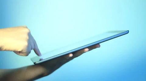 A business man is playing with iPad Stockbeeldmateriaal 36628671