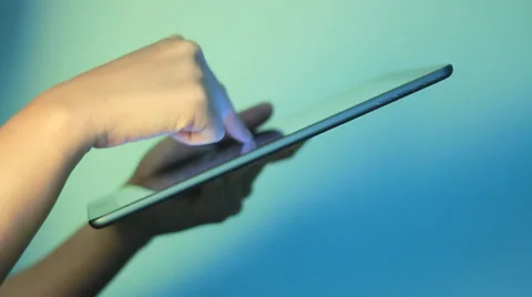 A business man is playing with iPad Stockbeeldmateriaal 36629247