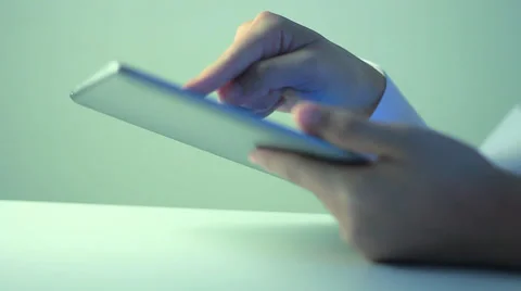 A business man is playing with iPad Stock Footage