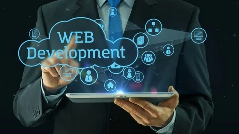 Business man pointing on web development concept tablet pad Stock Footage 73316702