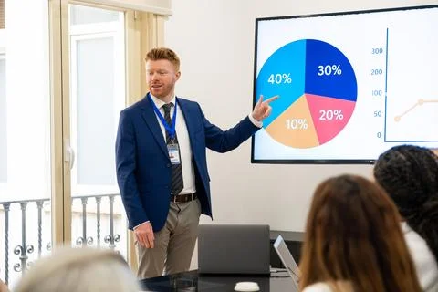 Business man presenting analytical data in corporate meeting Stock Photos