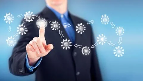 Business man pressing on button of digital virtual screen Stock Photos